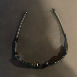 All black polarized sport oakleys.